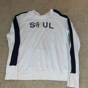 Soul cycle X Sundry long sleeve. Navy blue stripe on the arms. Good condition.